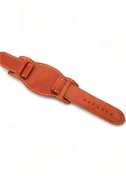 Brown leather strap on a white background